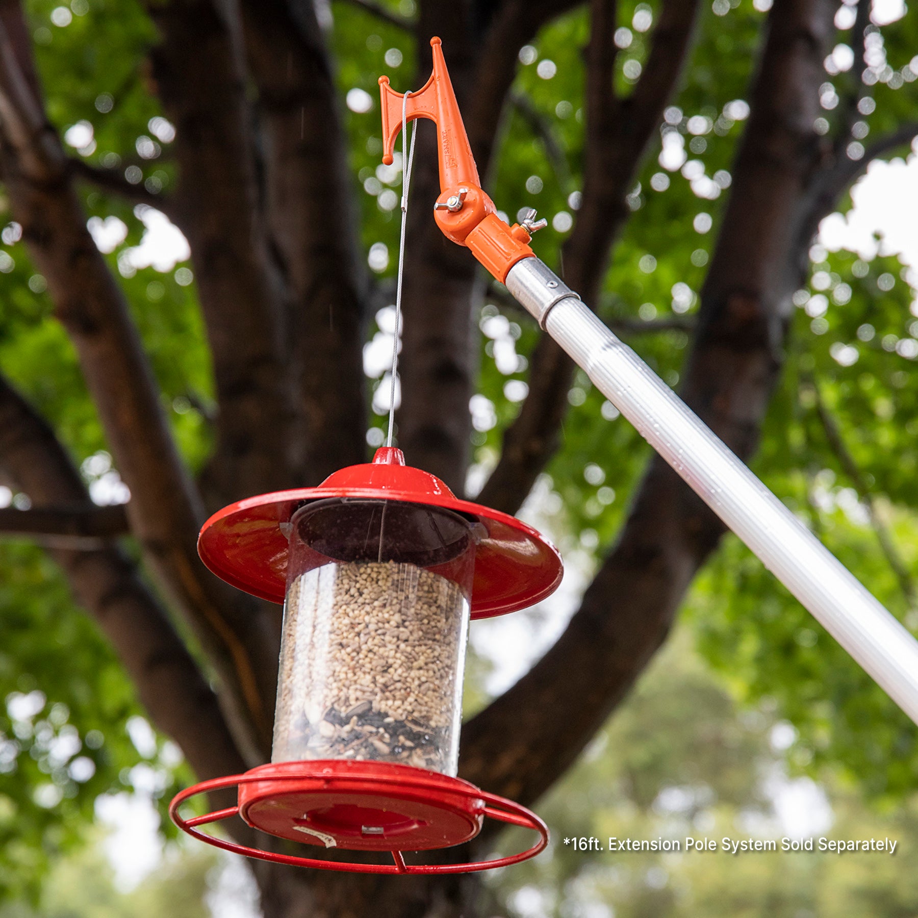 Handy Hook on extension pole hanging bird feeder; EZ Smart extension pole kit sold separately.