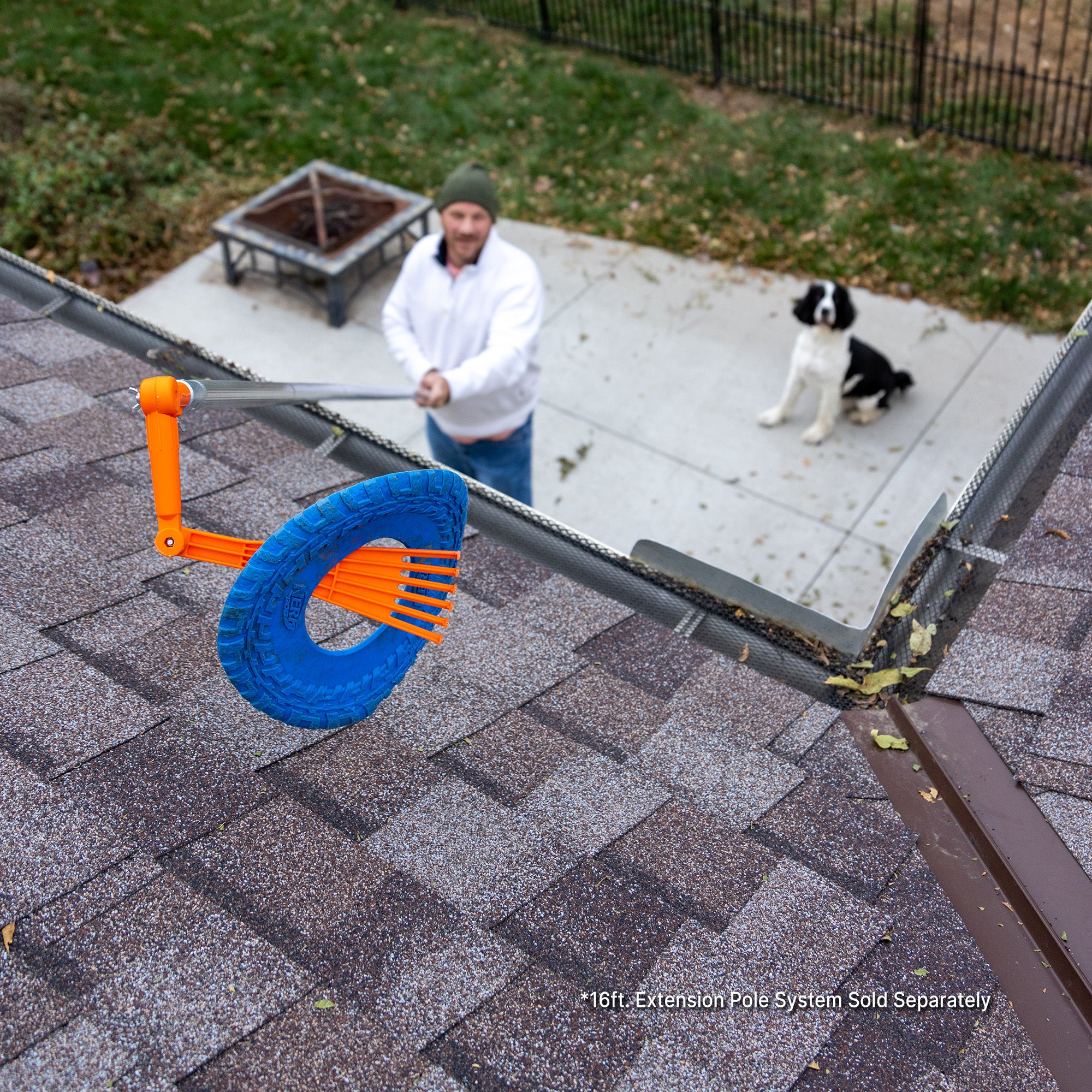 Person using EZ Smart Tools mini rake on extension pole to remove pet toy from roof; extension pole kit sold separately.